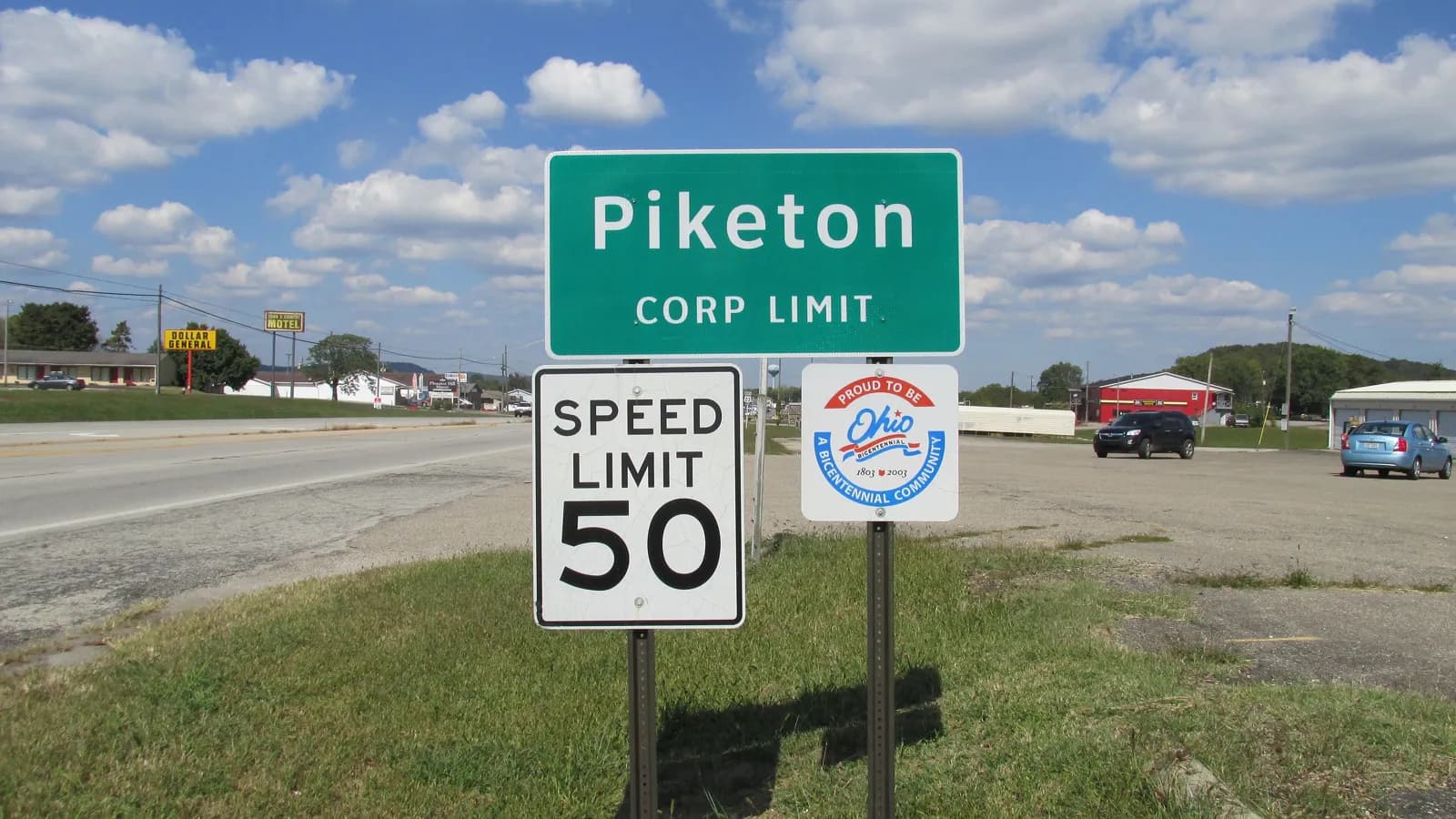 The Piketon corporation limit sign with a 50 mph speed limit sign